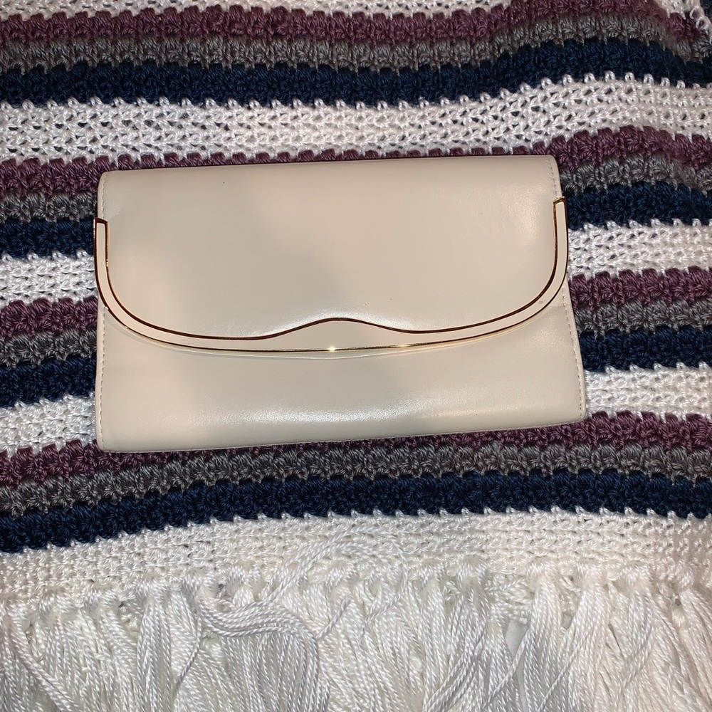 Cream and gold clutch